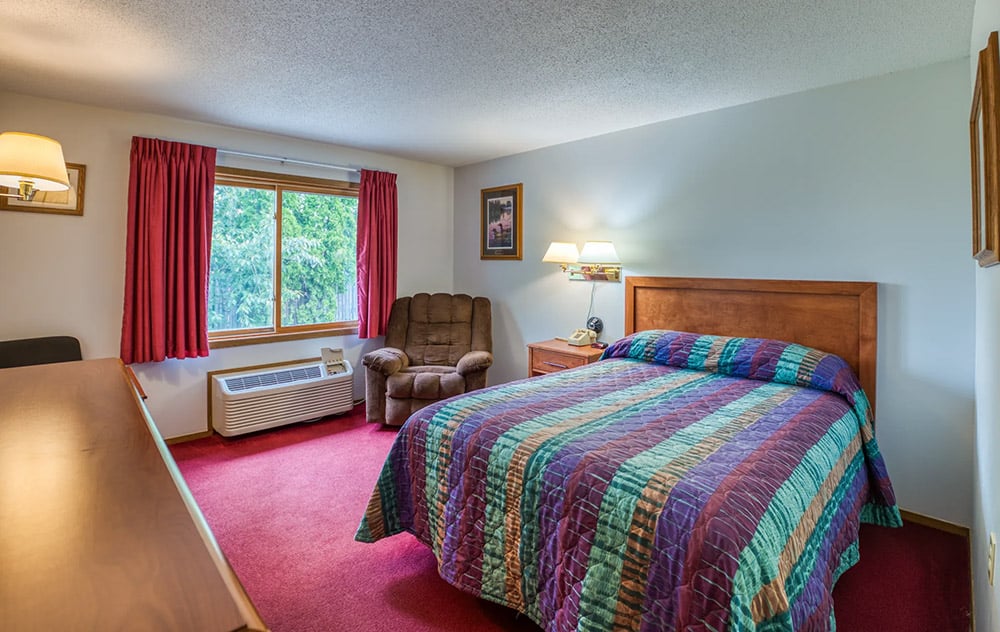 Room showing a queen bed at North Country Inn